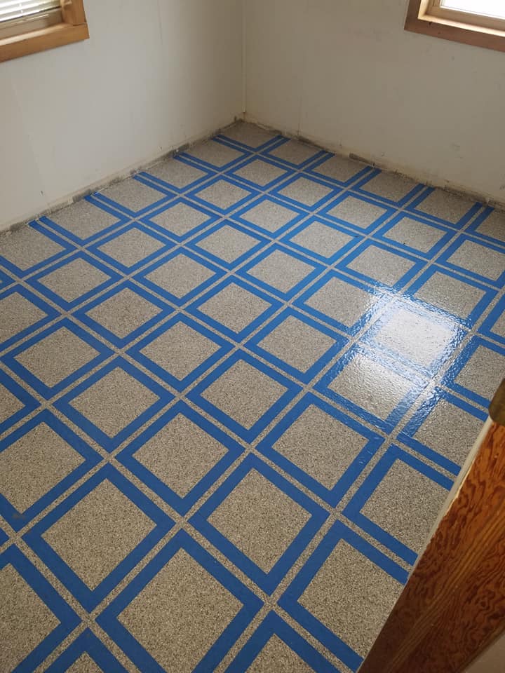 blue grid pattern on floor coating
